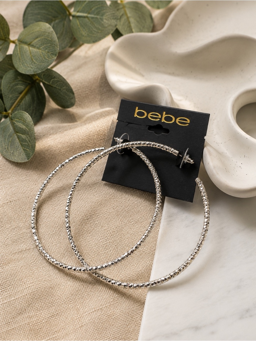 4/$23. Bebe Oversized Silver-Tone Textured Hoop Earrings (BR 1010/5)